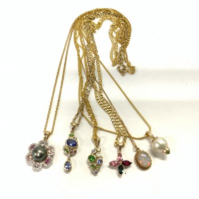 5 9ct gold and stone set pendants and chains. Total weight. 37.4g (A)