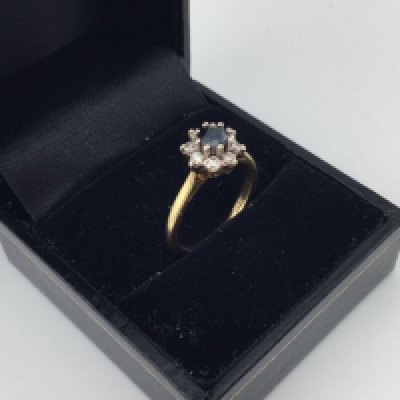 An 18ct gold sapphire and diamond set ring approx weight 3.33grams, size K.