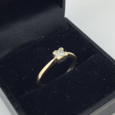 A 9ct old solitaire diamond set ring. Approx size L.