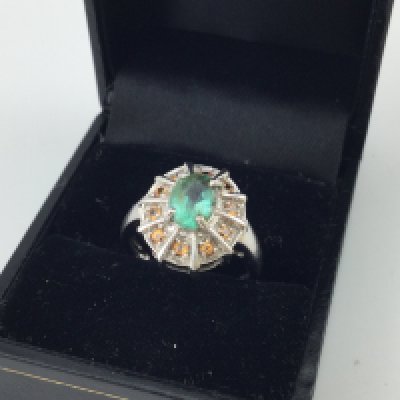 A 9ct white gold coloured stone set ring approx weight 3.87 grams. Size n.