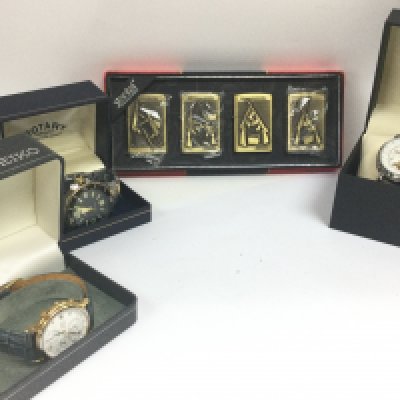 A collection of boxed watches including a Rotary Aquaspeed, Seiko quartz chronograph, Kronen & Sohne and a cased set of novelty Medal of Honour lighters.