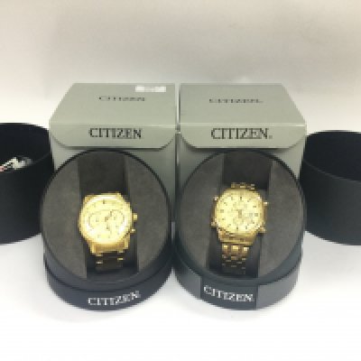 Two boxed Citizen watches including a quartz WR 100 and a WR 100 alarm chronograph. Postage category B