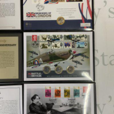 A folio of Beatrix potter Numismatic / Philatelic 50p coin covers together withheld 3 folios of uncirculated &pound;2 coins (B)