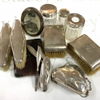 A small collection of hallmarked silver dressing table items etc.. (B)