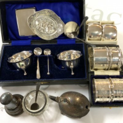 A small collection of hallmarked silver salts and napkin rings. (B)