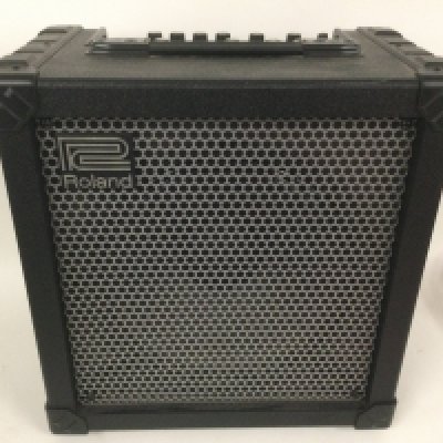 A Roland Cube 60 amplifier. <a href="https://www.the-saleroom.com/en-gb/auction-catalogues/staceys-auctioneers-and-valuers/catalogue-id-srsta10351/lot-0bba68b6-1c3b-4a45-b0b5-b24101152a0f"> Click Here to Register to bid </a>