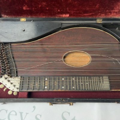 A late Victorian Blackwood Autoharp in wooden case with brass lock and handle. Requires restringing. All accessories in place and etched tuner surround shows light tarnishing consistent with age and use. <a href="https://www.the-saleroom.com/en-gb/auction-catalogues/staceys-auctioneers-and-valuers/catalogue-id-srsta10351/lot-0c76689d-aca8-4c95-b01d-b24101152c6d"> Click Here to Register to bid </a>