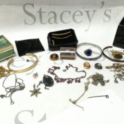 A collection of costume jewellery including necklaces, bracelets, brooches . Postage category B