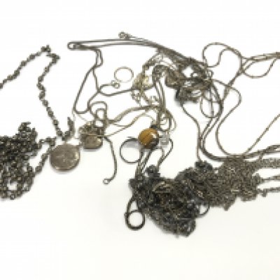 A collection of assorted silver jewellery including chains necklaces rings etc. 111g total.