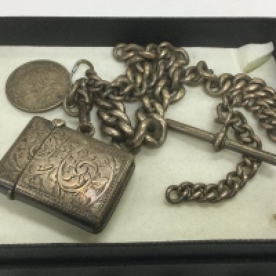 A silver vesta case and Albert chain. Shipping category A.