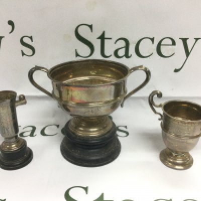Three silver trophy cups, different assays, tallest approx 15.5cm. Shipping category D.