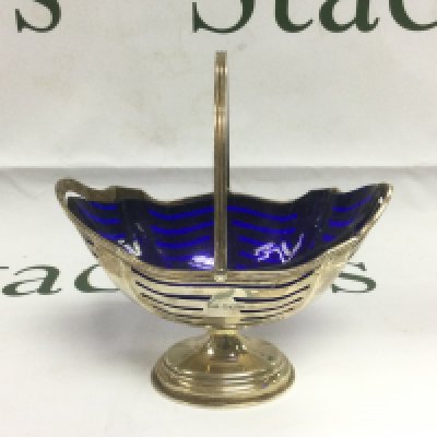 A silver swing handled sugar basket, Sheffield 1898. Shipping category D.