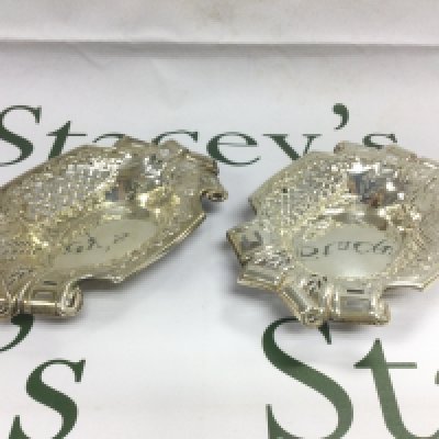 A pair of piercework silver dishes, approx length 15cm. Shipping category B.