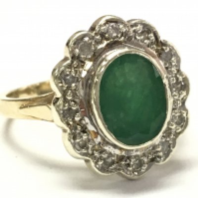 A 9ct gold emerald and diamond cluster ring size L/M. 4g total weight. Postage category A