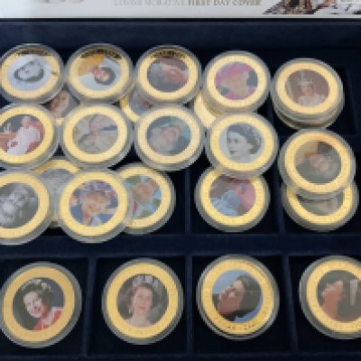 A large collection of commemorative coinage including numismatic and philatelic covers.