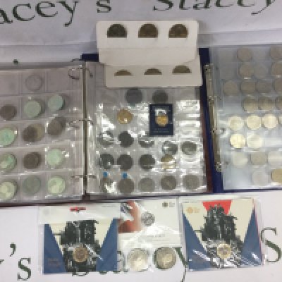 A collection of coins and banknotes, loose and in binders plus sealed proof sets. Shipping category D.