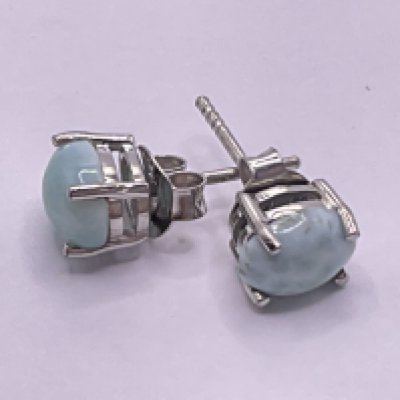 Pair of cabochon larimar studs in silver. Postage category A.