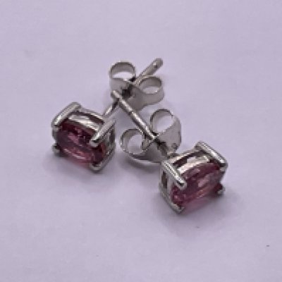 Pair of pink tourmaline studs in silver. Postage category A.
