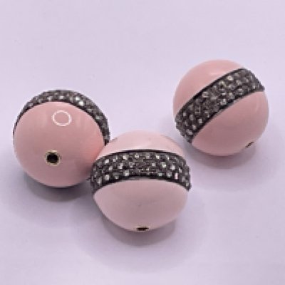 3 silver powder pink enamel beads each set with 3 rows of diamonds. Total diamonds 1.35ct (0.45ct each bead). Postage category A.