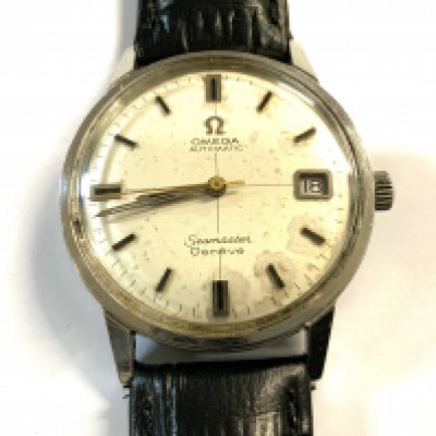 An 1968 Omega Seamaster, Date, Cal.565, Serial number 26361032 ( some toning).