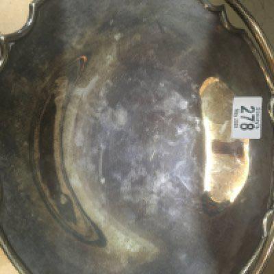 A silver swing handle basket 654 grams.