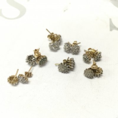 Seven pairs of 9ct gold cluster studs. Approx weight 9grams.