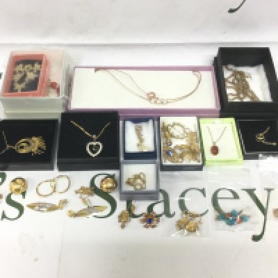 A collection of silver gilt jewellery comprising brooches, necklaces, earrings etc. Shipping category B.
