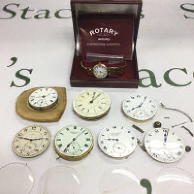A collection of watch parts and a boxed ladies Rotary watch. Shipping category D.