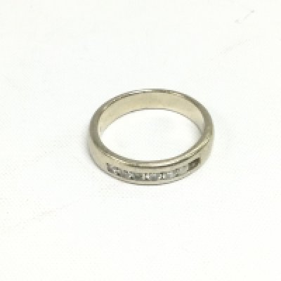 A 14k gold half eternity diamond ring, one stone missing, approx 7.8g and approx size U. Shipping category A.