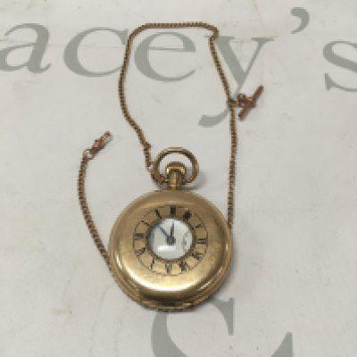 A gold plated hunter pocket watch with a 9 ct gold chain 5 grams.
