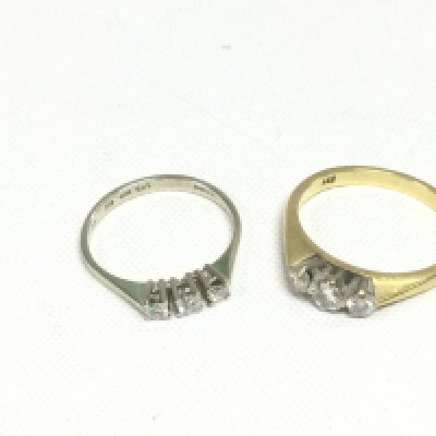 Two 18ct gold three stone diamond rings, approx 4.2g and approx sizes G-H and L. Shipping category A.