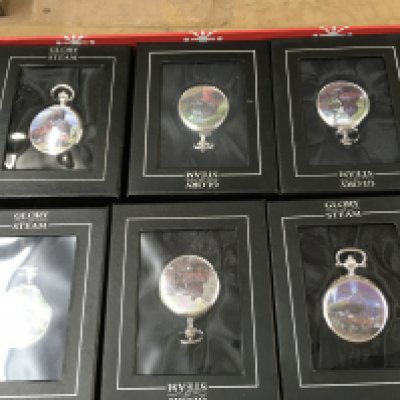 A collection of glory of steam modern pocket watches