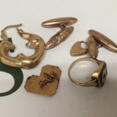 A collection of 9carat gold cufflinks an earring ring and other oddments. 12.5g