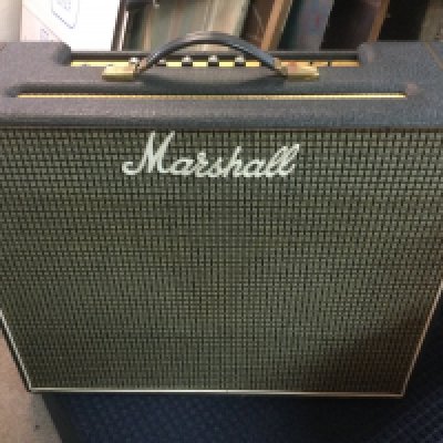 A rare 1975 Marshall JMP lead and bass combo amplifier fitted with 2x12" speakers. Originally only available as a mail order only item this is now a classic Marshall rarity. Comes with amp cover and power lead.