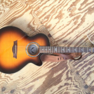 A Dean PE UFM TGE electro acoustic guitar. No case.