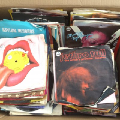 Three boxes of 7" singles and EPs by various artists including Jethro Tull, The Kinks, Bruce Springsteen and many more.