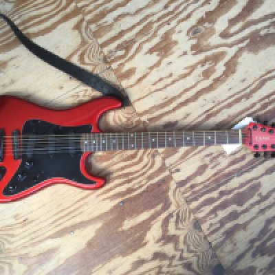 A Hondo Fame Series 760 12 string electric guitar. No case.