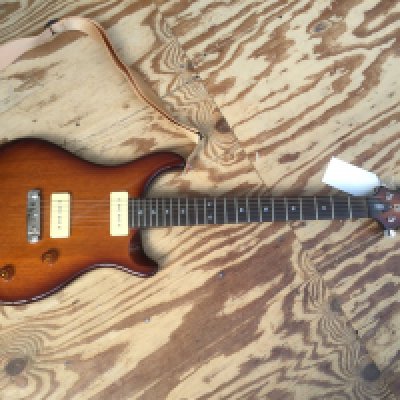 A PRS SE Soapbar II electric guitar. No case.
