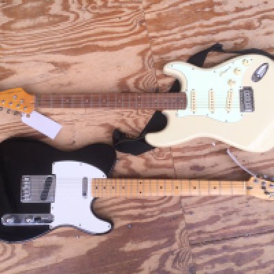 Two electric guitars comprising a Ferdinand Stratocaster style guitar and a Fenix Telecaster style guitar fitted with a Seymour Duncan bridge pickup. No cases.