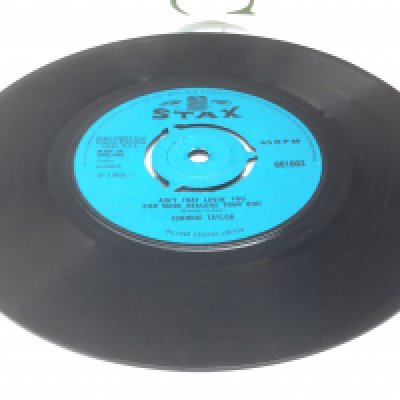 A rare Stax 7" single by Johnnie Taylor of Aint That Lovin You b/w Outside Love. Condition Ex.