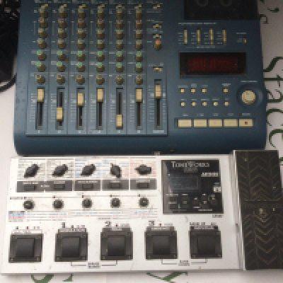 A Tascam 424 MKIII portastudio and a Korg Toneworks Ax1500G multi effects pedal.