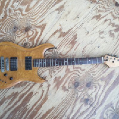 A scratch built electric guitar fitted with two humbuckers, grover tuners and a birds eye maple finish plus one other scratch built electro acoustic guitar fitted with a Seymour Duncan pickup. No cases. (2).