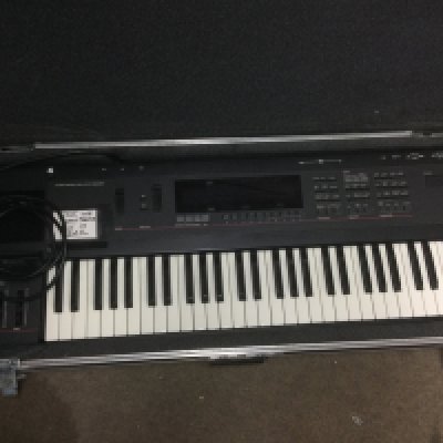 An Ansonia SD-1 synthesizer with hard carry case.