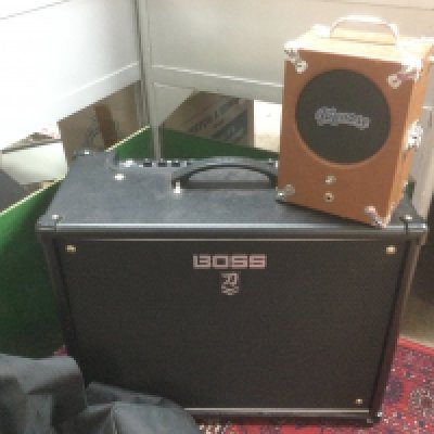 A Boss Katani amplifier and cover and a Pignose amp (2).