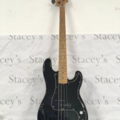 A Jodee Performer bass guitar. Comes with a soft carry case.