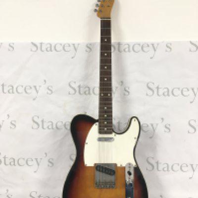 A Japanese Fender Telecaster electric guitar with a Fender branded hard carry case.