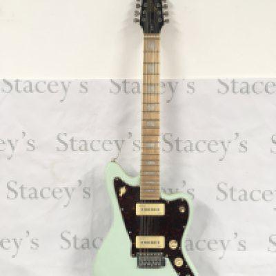 A Revelation 12 string electric guitar in sea foam green. Comes with a soft carry case.
