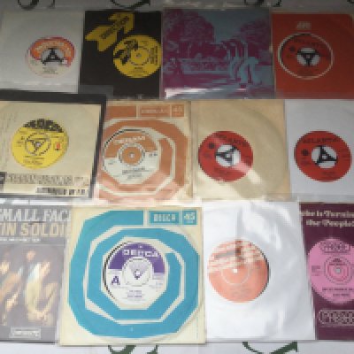 A collection of 12 rare 7" singles including demo discs. Various artists including Small Faces, Blues Magoos, Yes etc.