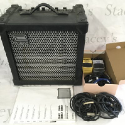 A Roland Cube 40XL amplifier and manual plus two Behringer effects pedals etc.
