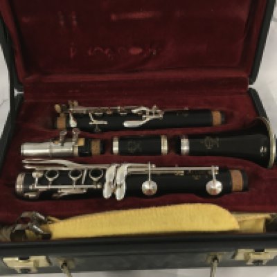 A cased Buffet clarinet.